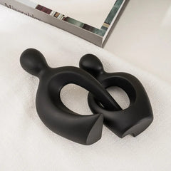 Skulptur „Umarmung“ – Modernes, abstraktes Liebespaar